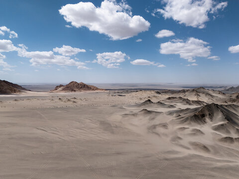 barren gobi desert dune landscape at hei du shan with blue sky