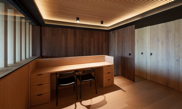 Coastal modern wooden home office with built-in desk