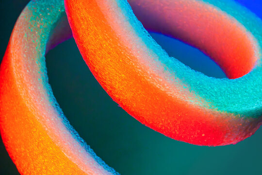 Vibrant neon foam ring abstract macro background