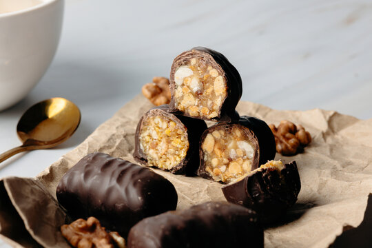 Chocolate-coated coconut sweet close-up