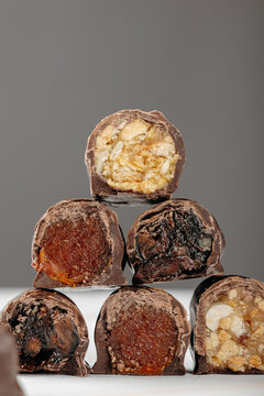 Chocolate covered date confection with nut filling macro