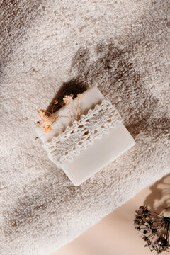 Handmade soap bar with lace and dried flower decor