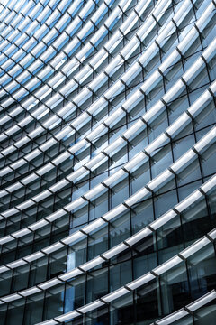 Curved geometric facade of contemporary office building