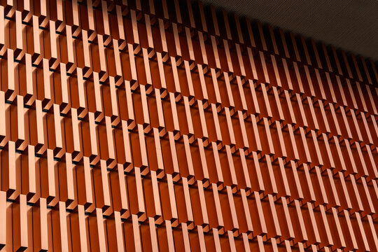 Terracotta geometric facade detail on contemporary urban building