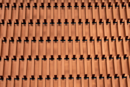 Geometric wooden facade detail on modern urban architecture