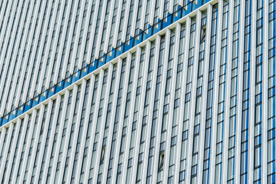 Modern office building facade with geometric window pattern