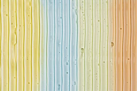 Pastel cosmetic gel smear texture with vertical streaks