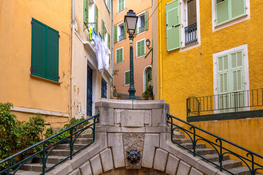 Colorful old town street in Villefranche-sur-Mer, France