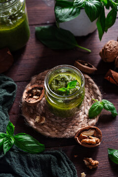 Walnut and basil pesto in a rustic glass jar