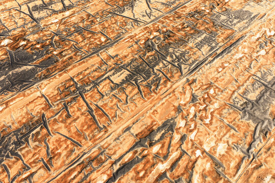 Abstract salt flat patterns in Toledo province during summer