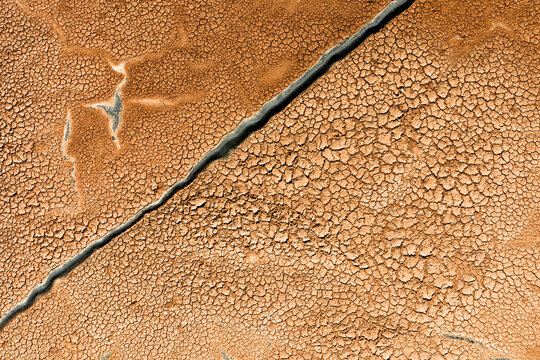 Abstract salt flat patterns in Toledo province during summer