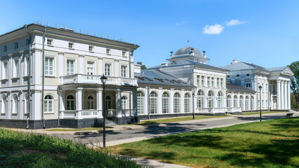 Fototapeta premium The magnificent Neoclassical Bulhak Palace in Zylicy under a clear blue summer sky.