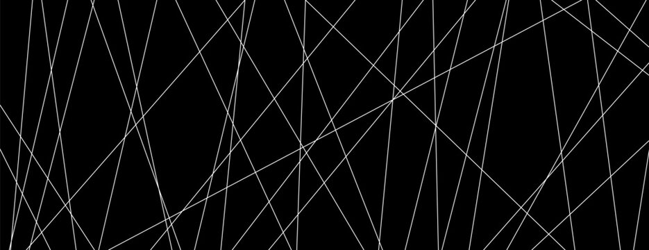 Straight chaotic random lines background. Intersecting white lines on a black background