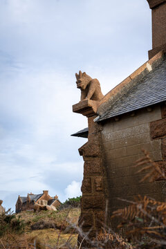 Gargoyle of Chapelle du Diable - Devil Chapel -  overlooking Tregastel coast, Brittany, France