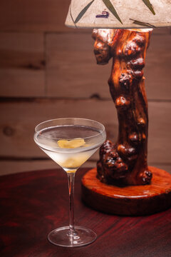Elegant cocktail in a martini glass. The classic Vesper Martini, stylized background adds moody sophistication. Ideal for upscale bar or cocktail menus
