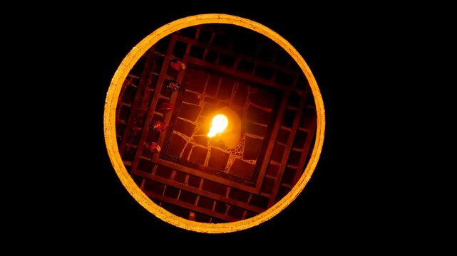 Volgograd, Russia. Hall of Military Glory. The eternal flame at the Mamayev Kurgan in Volgograd. At night. Drone footage, HEAD OVER SHOT with rotation