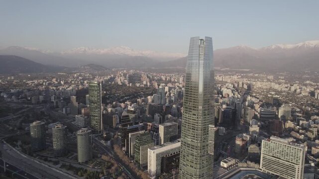 Drone Aerial Pan Shot Moving Right Toward Highway And Skyscraper In Santiago, Chile