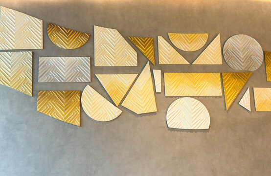 Modern Geometric Wall Art Installation on a Textured Grey Concrete Surface for Contemporary Interior Design