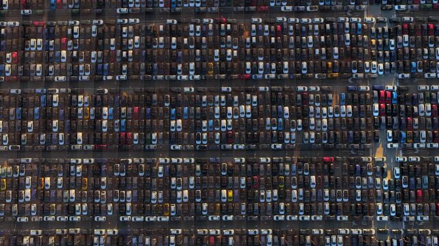 Aerial view of rows of parked cars in Civitavecchia, Italy.