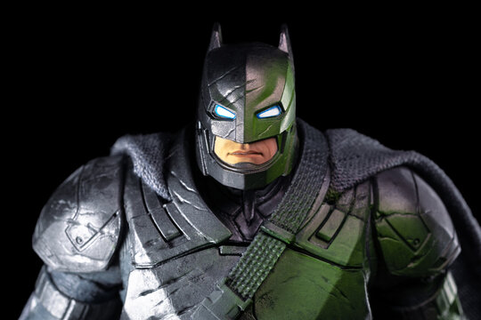 DC Batman Bruce Wayne in armor suit on a black background