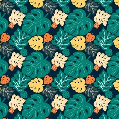 Seamless pattern featuring stylized monstera leaves in vibrant green orange and yellow colors © kee