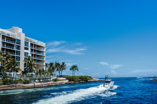 View of Boca Raton Inlet, Florida with boat in ocean