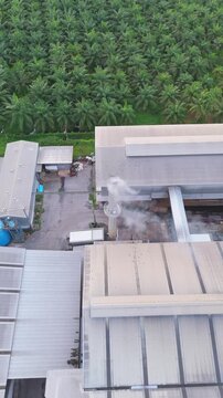 Aerial view clean air with exhaust pipe for air pollution reduction. Economic growth, industrial energy, Environment, and sustainability. Business and technology development nature. Factory Palm oil
