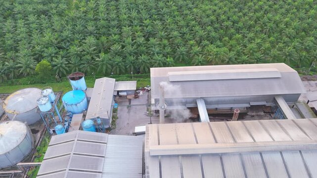 Aerial view clean air with exhaust pipe for air pollution reduction. Economic growth, industrial energy, Environment, and sustainability. Business and technology development nature. Factory Palm oil