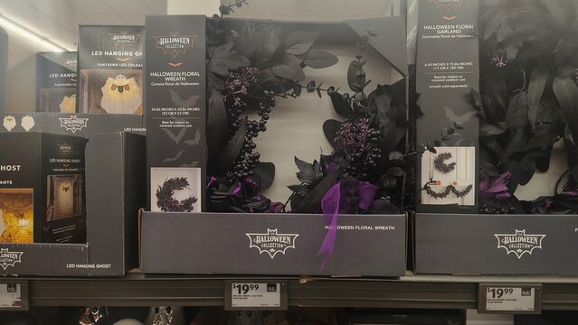 Chantilly, Virginia, USA &ndash; September 13, 2026: Decorative Halloween wreaths on a store shelf. Holiday collection items are on display in the supermarket: gothic wreaths and garlands in black