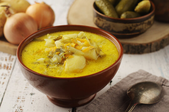 A bowl with traditional soup in Poland Zupa Ogorkowa