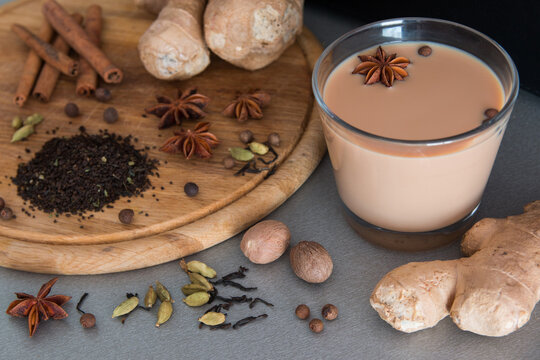 Hot Masala Tea Cup with Steam and Aromatic Indian Spices for Beverage and Culinary Design