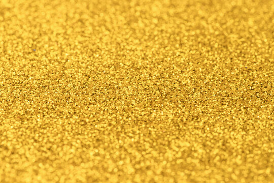 gold dust with bokeh texture as a background