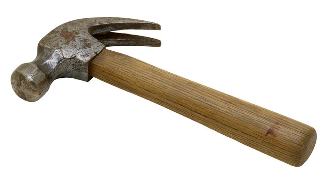 Isolated well-worn claw hammer featuring a rustic textured metal head and wooden handle close-up