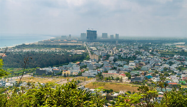 A view towards the city centre from the Marble Mountains in Da Nang, Vietnam on a bright sunny day