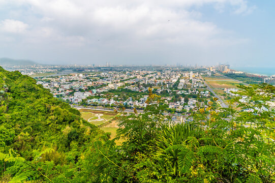 A view north over the surrounding landscape from the Marble Mountains in Da Nang, Vietnam on a bright sunny day