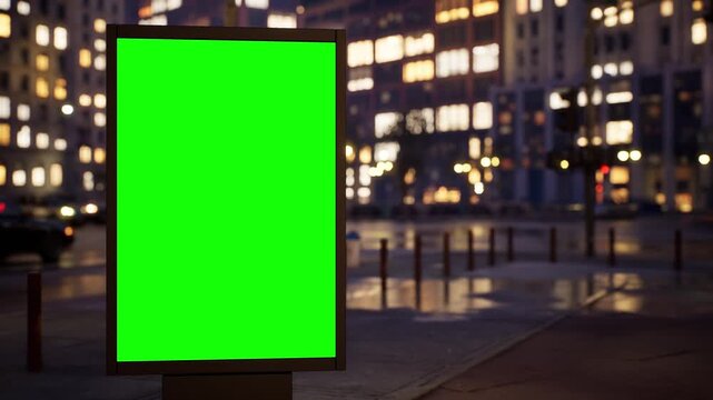 Green screen billboard mockup in a modern city in the evening blue hour with lit windows, cloudy sky. Timelapse of street traffic with defocused buildings and glowing windows in the background