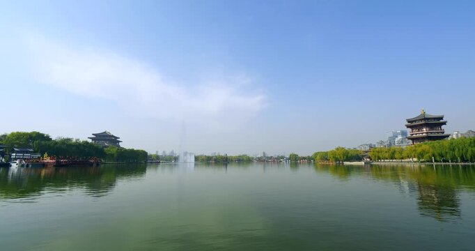 Calm Lake View with Traditional Chinese Pavilions and Fountain in Xi'an, China