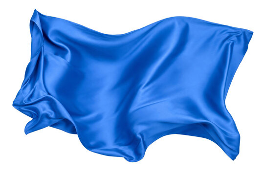 Flowing blue silk fabric isolated on a white background with soft elegant waves and folds