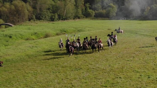 Aerial tracking of mounted troops on grassland