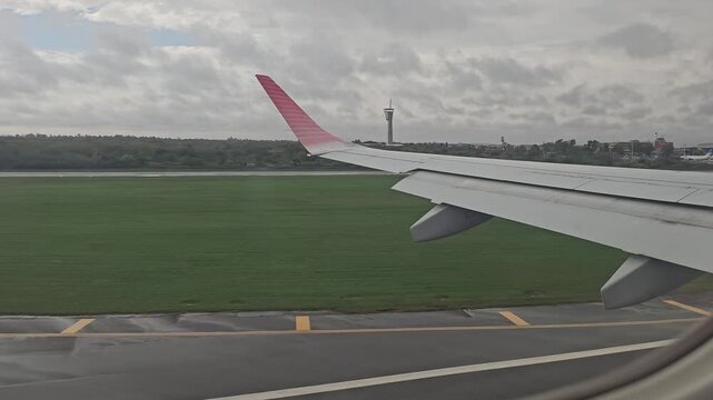 Airplane Touchdown and Runway Roll at Ezeiza Airport