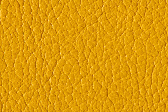 Yellow leather texture background with fine grain and natural pattern