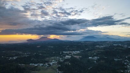 sunset over the volcanoes guatemala drone shot © Erick