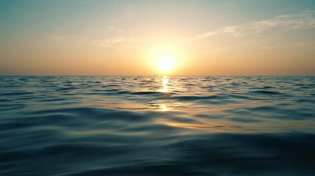 Golden sunset over calm ocean waves, serene tropical sea horizon at dusk, peaceful nature background, for meditation and relaxation
