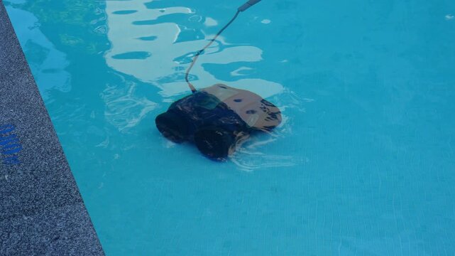 Automatic Pool Cleaning Robot Underwater In Swimming Pool