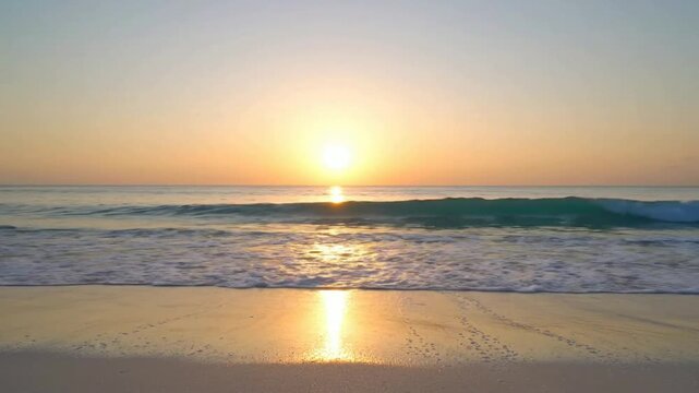 Golden hour sunset over tropical ocean waves, serene beach seascape with gentle surf and reflective sunlight on wet sand