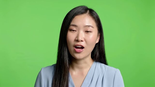 Asian Woman Expressing Emotions on Green Screen Seamlessly Animated