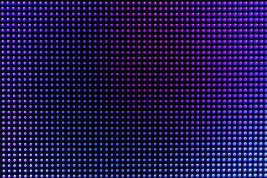 RGB subpixel grid array macro photograph on a modern LED television screen display matrix showing