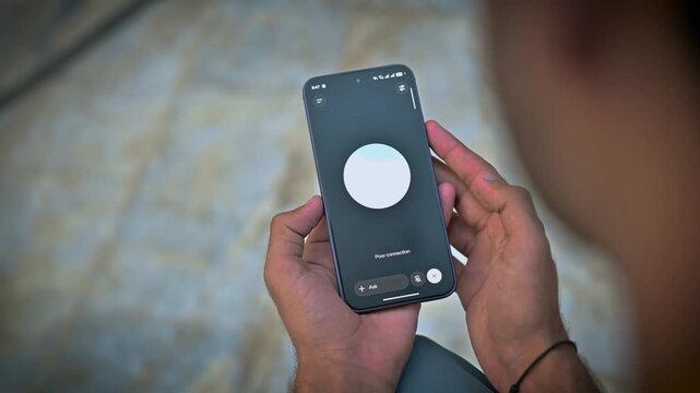 Animated glowing voice circle interface pulsing while active during a smart speaker conversation