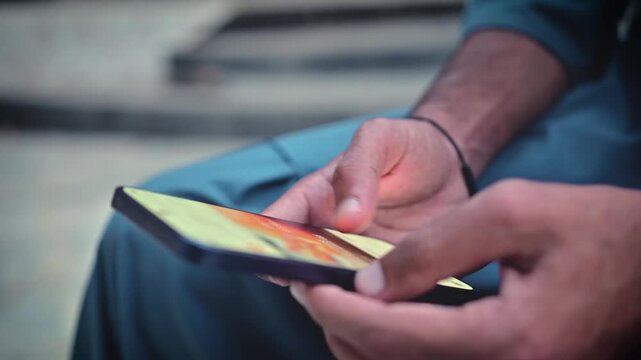 Casual user browsing digital content and tapping through feeds on a mobile touchscreen device