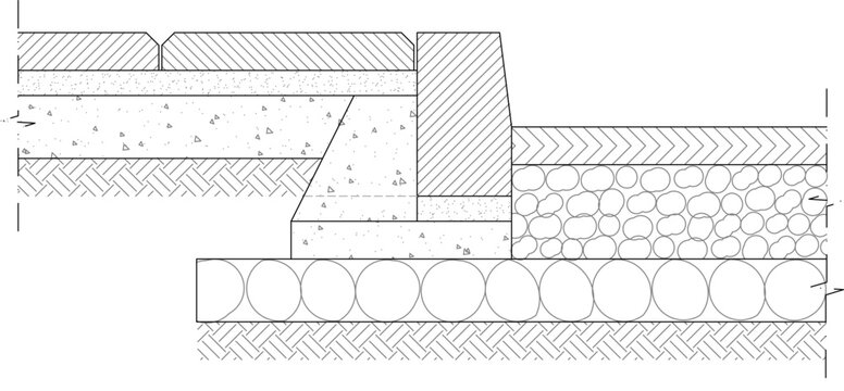 Technical CAD cross-section detail of a pavement or foundation system showing layered construction with concrete, granular fill, drainage aggregate, and compacted sub-base materials.